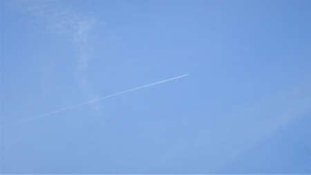 Trace and rocket on the sky above a South American horizon.の写真素材