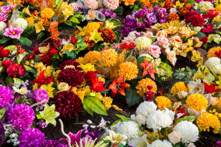 Artificial flowers of various kinds, colors and sizes