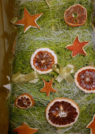 Original Christmas decorations - rings and stars - cut from dried orange peel.の写真素材