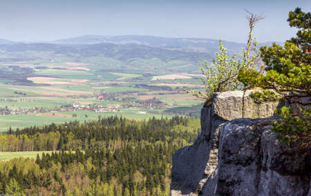 Spectacular view from top of Strzeliniec Wielki Peak, Poland with vertical rocks and large vistas of space down below の写真素材