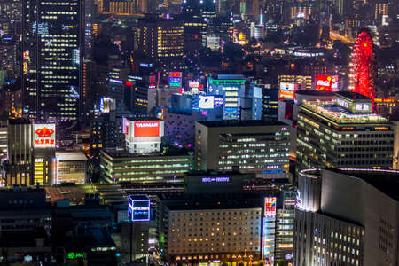 Osaka, Japan -  June 17, 2006  Aerial view of Osaka city centre by night seen from Umeda Sky Building on June 17, 2010  Osaka is Japanのeditorial素材