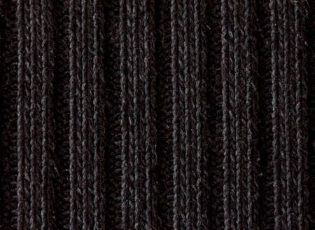 dark woolen textile pattern texture backgroundの写真素材