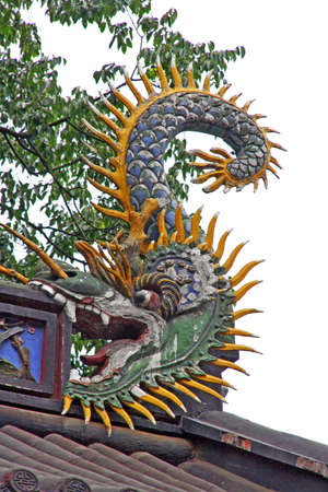 ornamental dragon statue at a chinese templeの写真素材