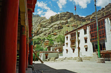 lamaist monastery in ladakh, India stylized and filtered to look like an oil painting. In background...