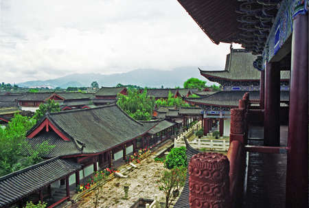 vintage style photo of aerial view of ancient mu palace in lijiang, chinaのeditorial素材