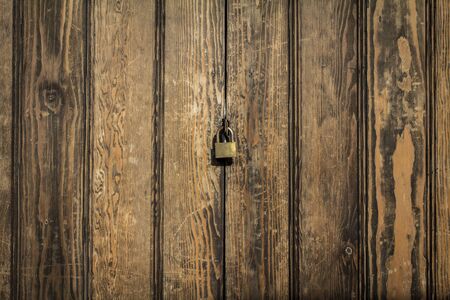 wood panels background with lock in theの写真素材