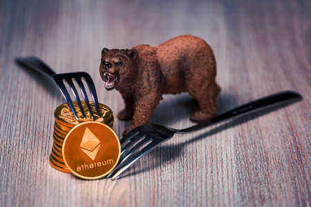Stack of Ethereum cryptocurrency bearish fork conceptの写真素材