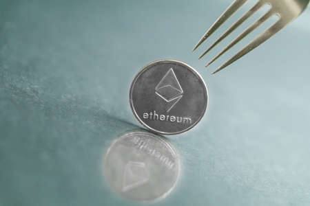 Ethereum cryptocurreny fork concept with reflection, hard forkの写真素材