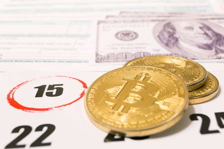 2019 calendar with 1040 income tax form for 2018 showing tax day for filing on April 15の写真素材