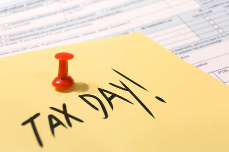 2019 calendar with 1040 income tax form for 2018 showing tax day for filing on April 15の写真素材