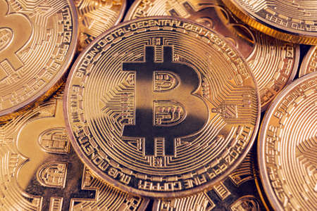 Golden Bitcoin coins. New digital and virtual money.の写真素材
