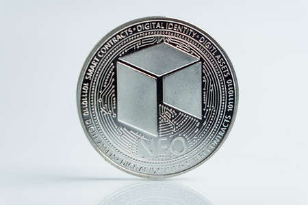 NEO. Crypto currency silver coin, Macro shot of NEO coin isolated on white background, cut out Blockchain technology,の写真素材