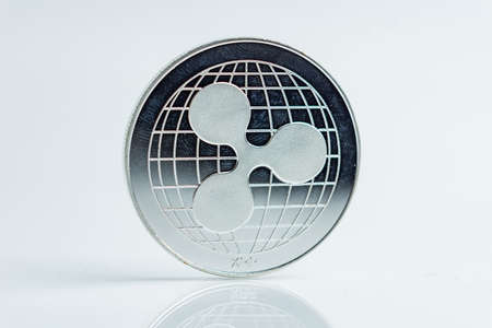 Ripple. xrp Crypto currency silver coin, Macro shot of ripple coin isolated on white background, cut out Blockchain technology,の写真素材