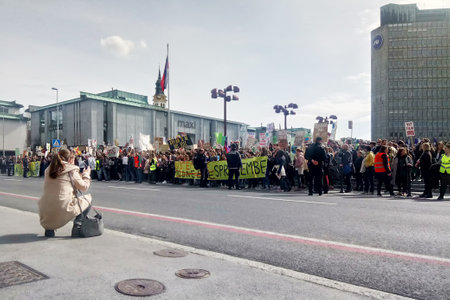 Slovenia, Ljubljana 15.03.2019 - Young protestors with banners at a Youth strike for climate marchのeditorial素材