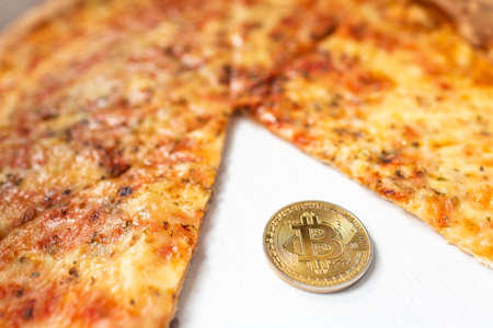 Bitcoin pizza day anniversary. The first reported exchange of cryptocurrency for a consumer product on May 22, 2010.の写真素材