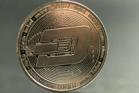 Dash. Crypto currency silver coin, Macro shot of Dash coin isolated on background, cut out Blockchain technology,の写真素材
