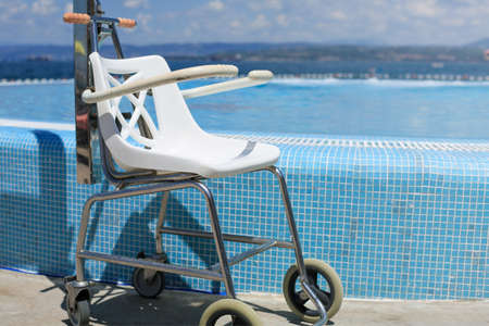 Adapted beach and pool with lift for disabled swimmers.の写真素材