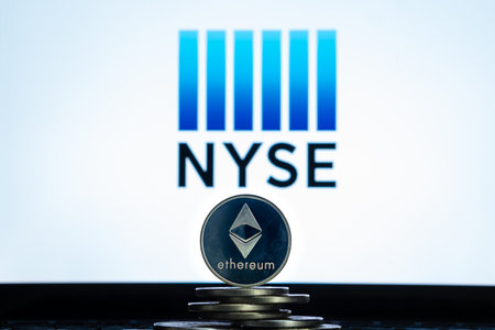 Ethereum coins with NYSE logo on a laptop screen. Slovenia, Ljubljana - 02 24 2019のeditorial素材