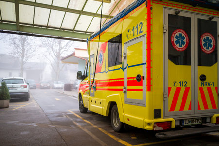 Slovenia, Domzale - 23 12 2019: Ambulance vehicle parked at hospital.のeditorial素材