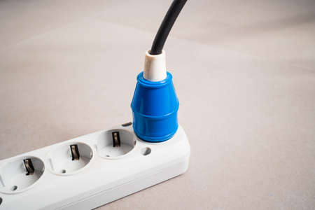 Connected electric power board plug, close up