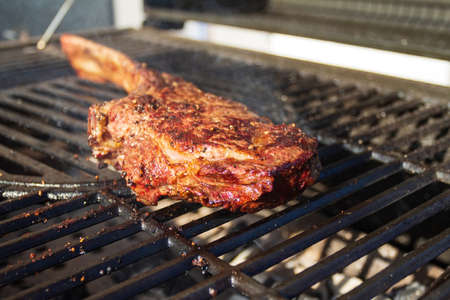 Dry Aged Barbecue Tomahawk Steak on grillの写真素材