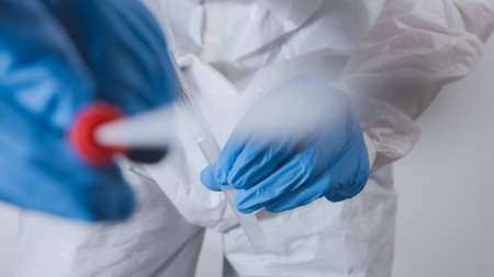 Nurses put a nasal swab into a tube. POV view shot.の写真素材