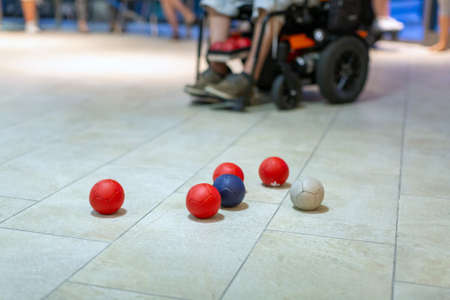 Disabled Boccia player playing on a wheelchairの写真素材
