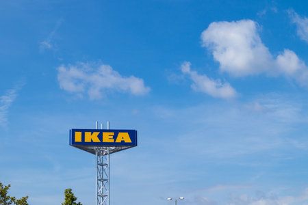 SLOVENIA, LJUBLJANA - 19 September 2020: IKEA sign board against blue sky. Swedish furniture retailer.のeditorial素材