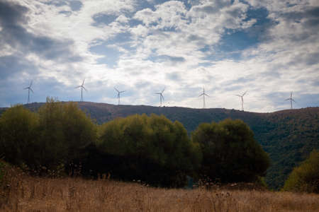 Aerial view of a wind turbine power plant in the mountainous region.の写真素材