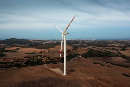 Aerial view of a wind turbine power plant in the mountainous region.