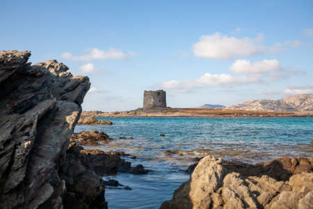 Medieval Castle tower on Stintino Beach Sardinia, Italyの写真素材
