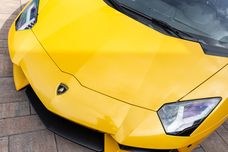 Slovenia, Ljubljana - July 5 2021: Yellow luxury supercar Lamborghini Aventador on street.のeditorial素材