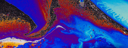 Colorful liquid mixture, blending paints in dynamic abstract fluid texture background, close up...