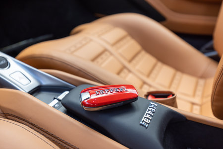 Slovenia, Ljubljana - 2 June 2022: Red Ferrari F8 Tributo Italian luxury sports car key