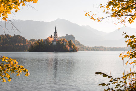 Alpine Bled lake in Slovenia, amazing nature and scenic landscape with church on island and castle on a cliff.の写真素材