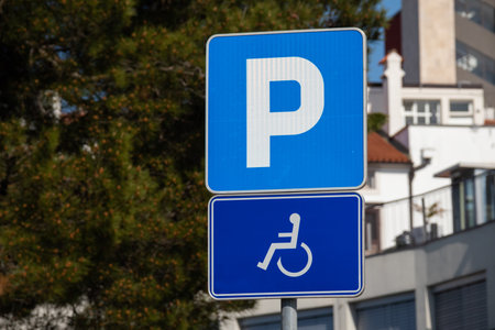 Parking spot for persons with disability with wheelchair sign.の写真素材