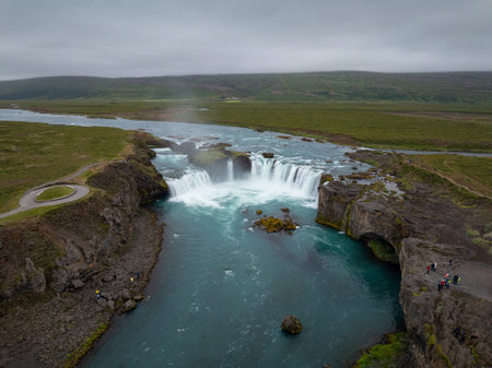 Fantastic shot of the Godafoss waterfall in Iceland and its incredible surroundings, aerial view. Tourist attraction and natural beauty concepts.の写真素材
