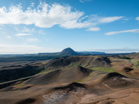 Panorama view of Ring Road in Iceland and scenic landscape of volcano rock formations on a bright summer day, aerial shot. Travel destination concept.の写真素材