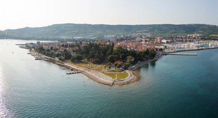 Stunning old town Izola in Slovenia at sunset, a picturesque Mediterranean settlement, aerial shot. Vacation, travel, and tourism concepts.の写真素材