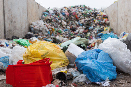 Landfill with trash and garbage polluting environment waiting to recycleの写真素材