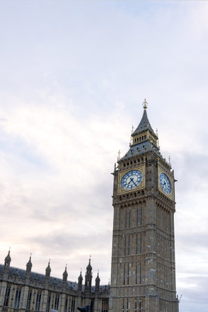 Palace of Westminster with its distinctive Tower of Big Ben at sunset and beautiful coloured sky, handheld shot.の写真素材