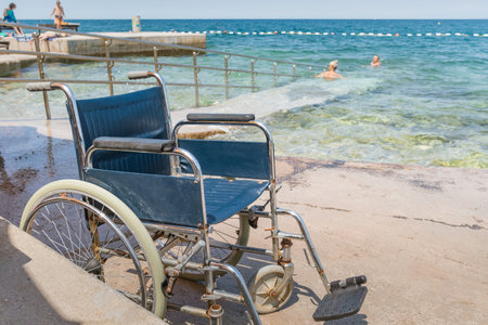 Accessible beach with wheelchair with ramp for persons with disabilityの写真素材