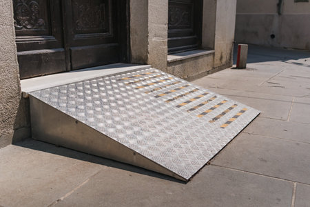 Ramp for persons with disability on wheelchair for accessible entrance.の写真素材
