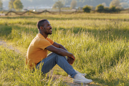 Father enjoy time outdoors in nature, relaxed and calmの写真素材