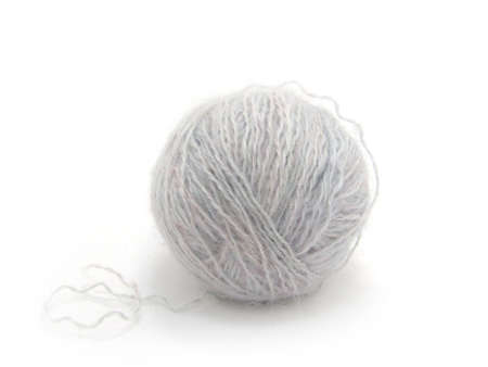 Ball of a grey wool on a white background                