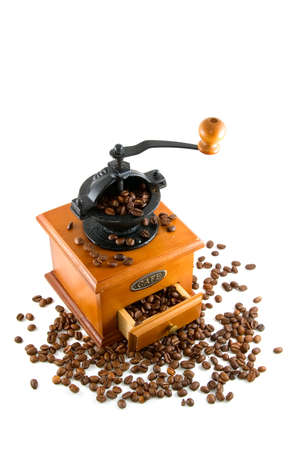coffebeans and grinder on a white backgroundの写真素材