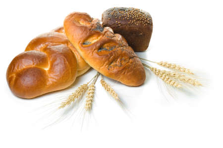 Various fresh baked goods with wheat grain and a cereal ears