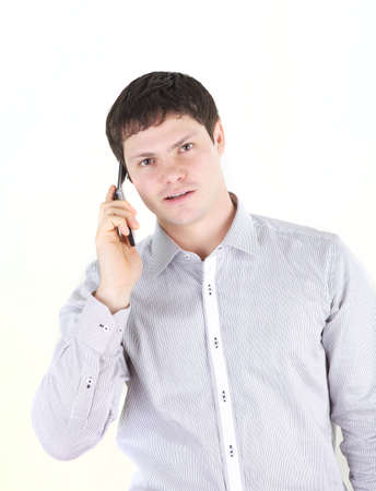 Young man speaking the cellphoneの写真素材