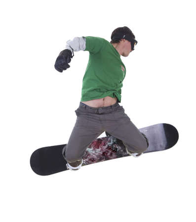 Jumping snowboarder isolated on white backgroundの写真素材