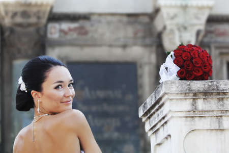 bride with beautiful red rosesの写真素材
